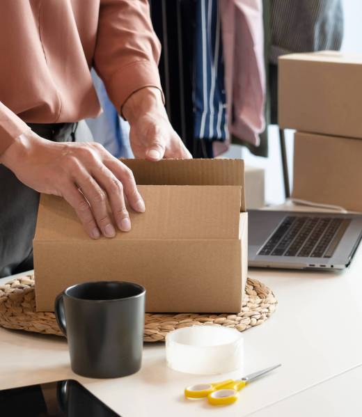 Asian business owner working at home with packing box of his online store prepare to deliver products to customers, alpha generation life style concept